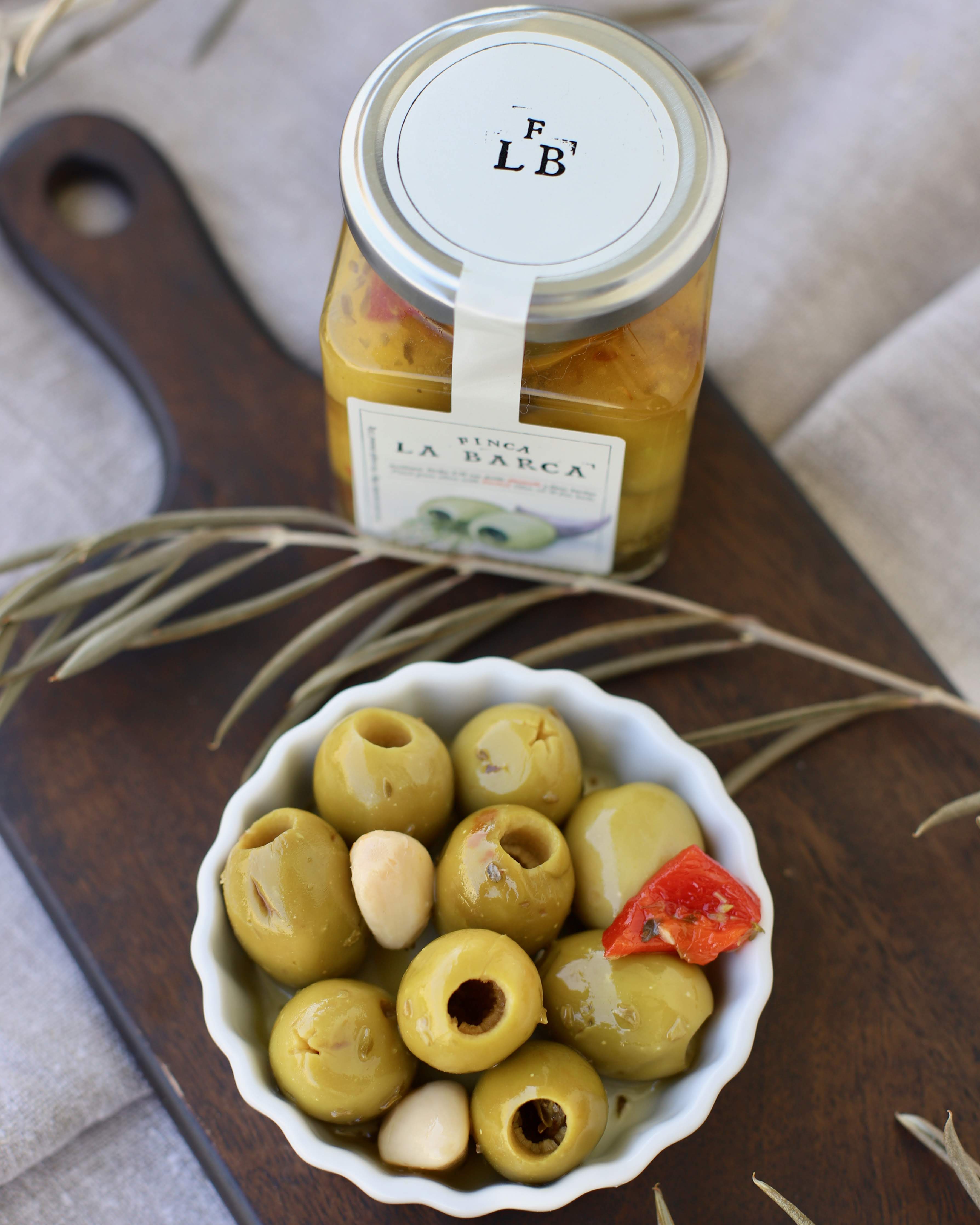 Entkernte grüne Oliven mit  feinen Kräutern und geräuchertem Olivenöl 130 g