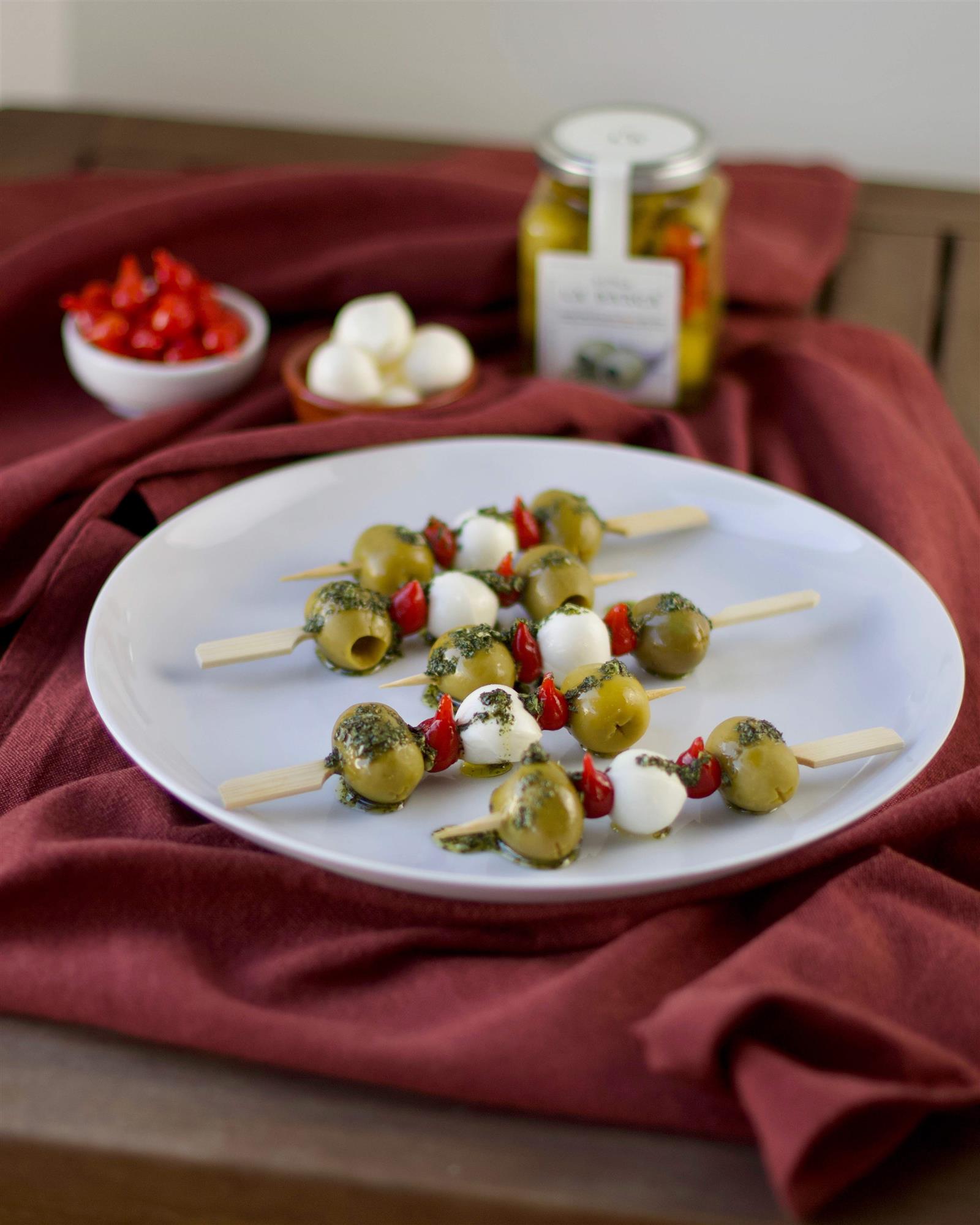 Entkernte grüne Oliven mit geräuchertem Paprika und geräuchertem Olivenöl 130 g